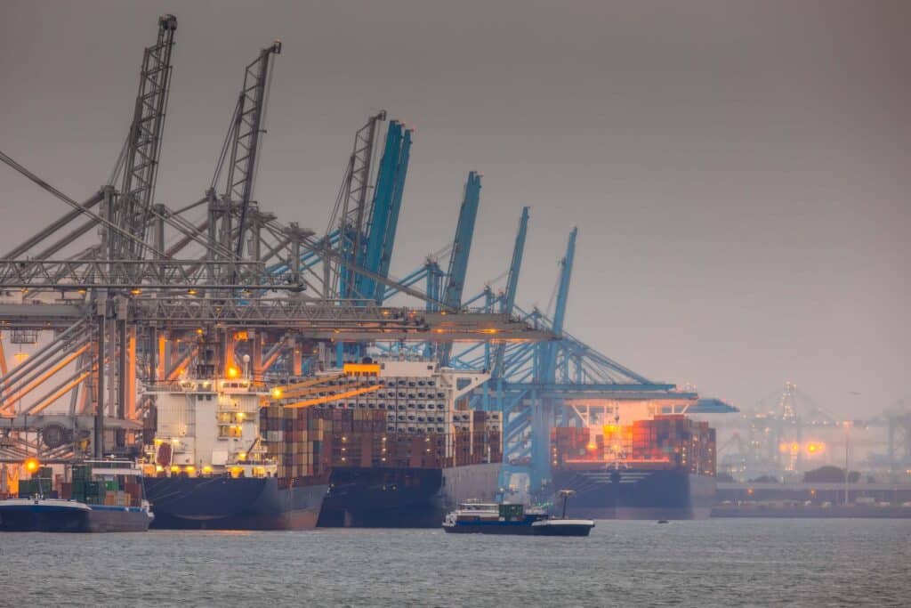 A busy port on a foggy night.