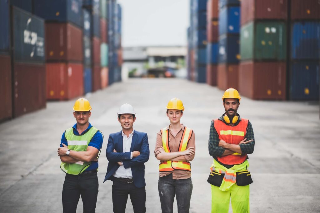 Port operations team in container yard representing coordination in port call management