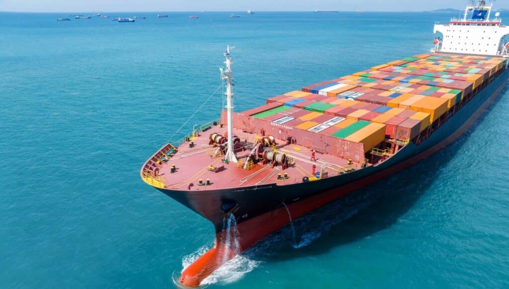 Container ship at sea representing the shipping documentation process for international cargo transport