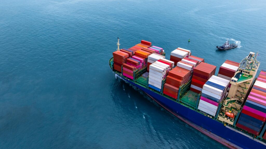 Port vendor reliability in action as a tug assists a container ship during a time-sensitive port call.