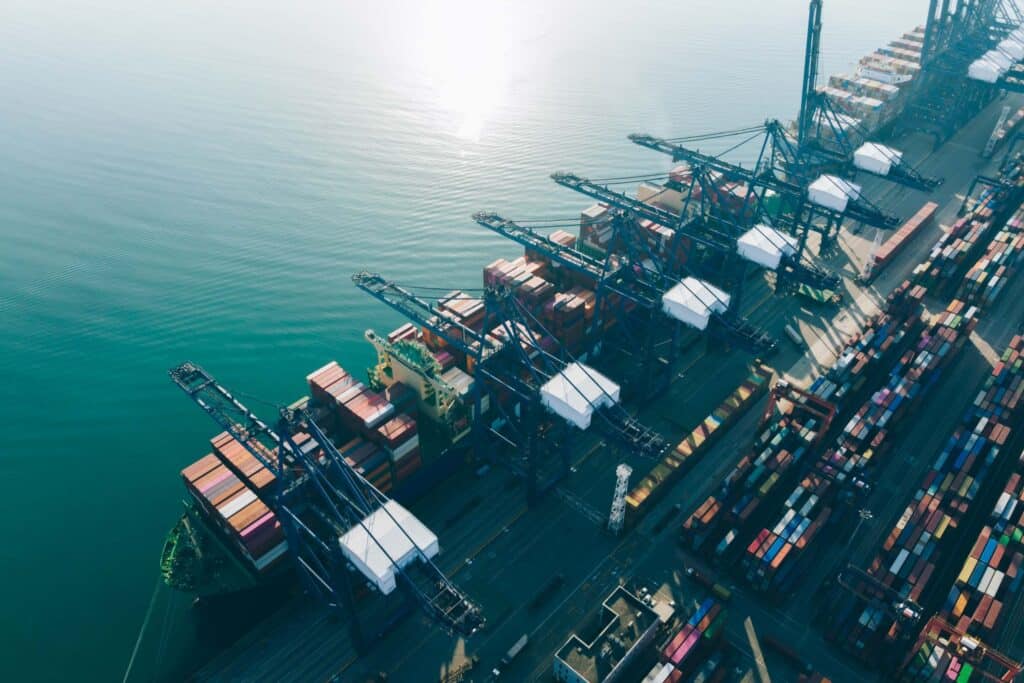 Aerial view of a container terminal supporting outsourced disbursement account processing across active port calls